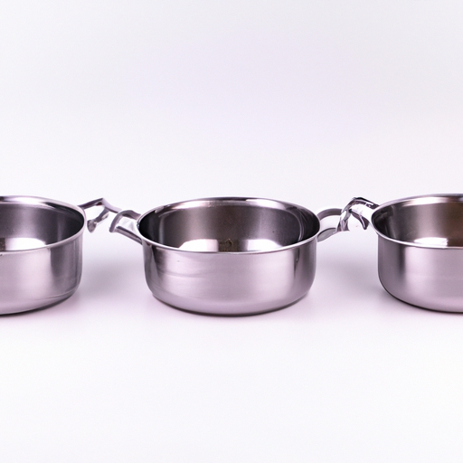 A variety of high-quality cookware including pots, pans, and utensils.